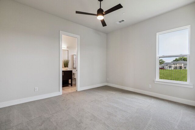 1644 Aster Way, Celina, TX 75009 - empty room featuring light carpet, a ceiling fan, and baseboards