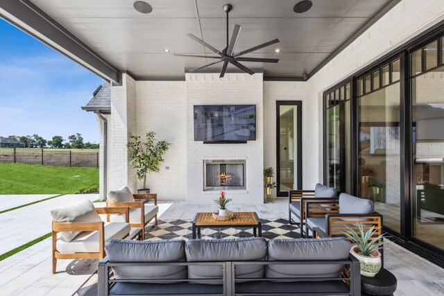 1644 Aster Way, Celina, TX 75009 - view of patio / terrace with an outdoor living space with a fireplace and ceiling fan