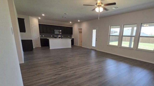 506 Shady Bank Way, Josephine, TX 75173 - unfurnished living room with dark wood-style floors, recessed lighting, ceiling fan, and baseboards