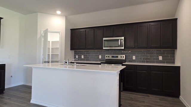 506 Shady Bank Way, Josephine, TX 75173 - kitchen with appliances with stainless steel finishes, dark wood-style floors, decorative backsplash, baseboards, and vaulted ceiling