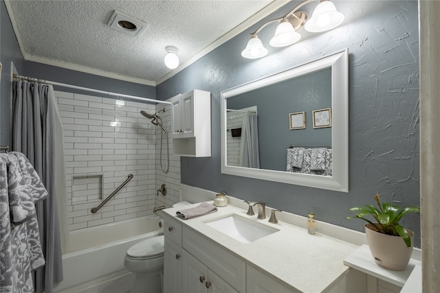 full bathroom featuring vanity, ornamental molding, a textured ceiling, shower / tub combo, and toilet