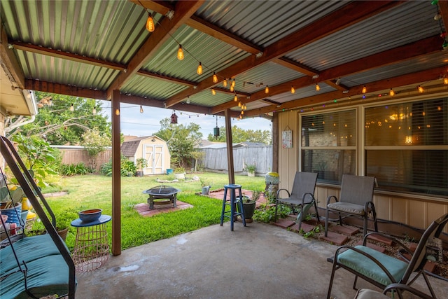 view of patio / terrace with a storage unit