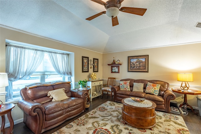 living room with ceiling fan, a textured ceiling, lofted ceiling, and dark hardwood / wood-style floors