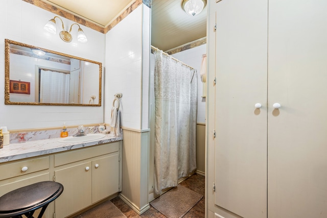 bathroom featuring vanity and a shower with curtain