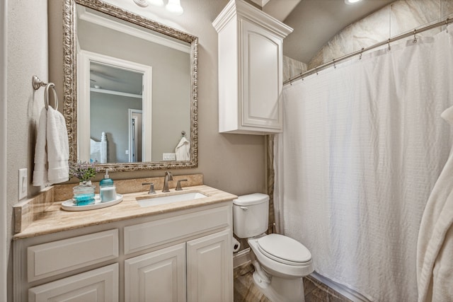 bathroom featuring vanity, curtained shower, toilet, and crown molding