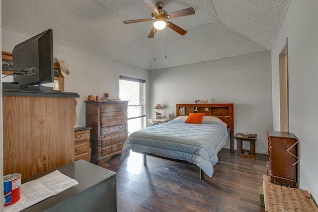 613 Purple Sage Trl, Mesquite, TX 75149 - bedroom with vaulted ceiling, wood finished floors, a textured ceiling, and a ceiling fan