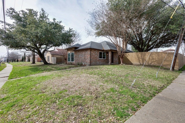 exterior space with a lawn