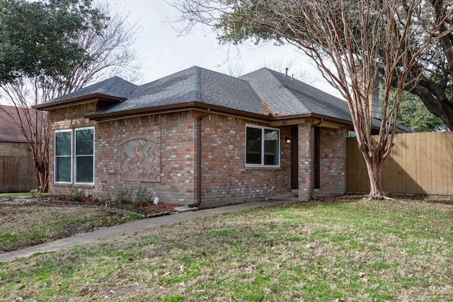 view of front of home with a front yard