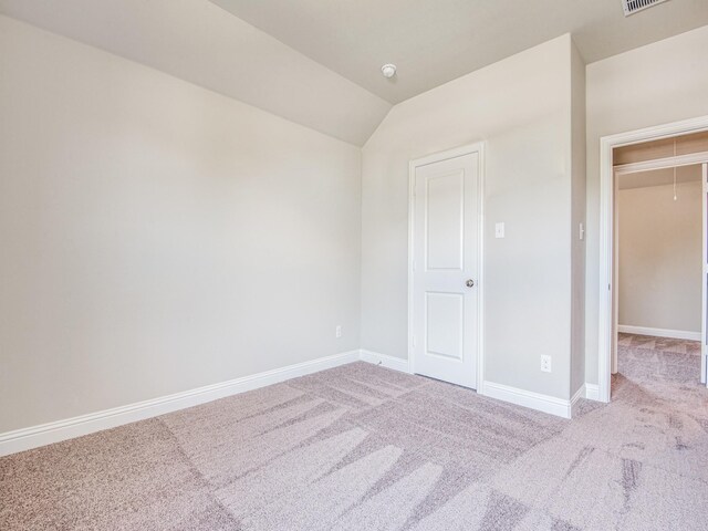 walk in closet featuring carpet flooring