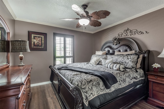 bedroom with ceiling fan, a textured ceiling, and ornamental molding