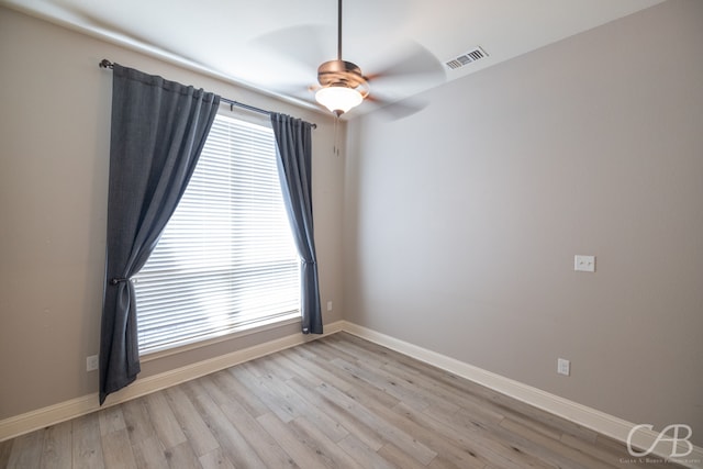 unfurnished room with ceiling fan and light hardwood / wood-style flooring