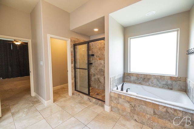 bathroom with ceiling fan, independent shower and bath, and tile patterned floors