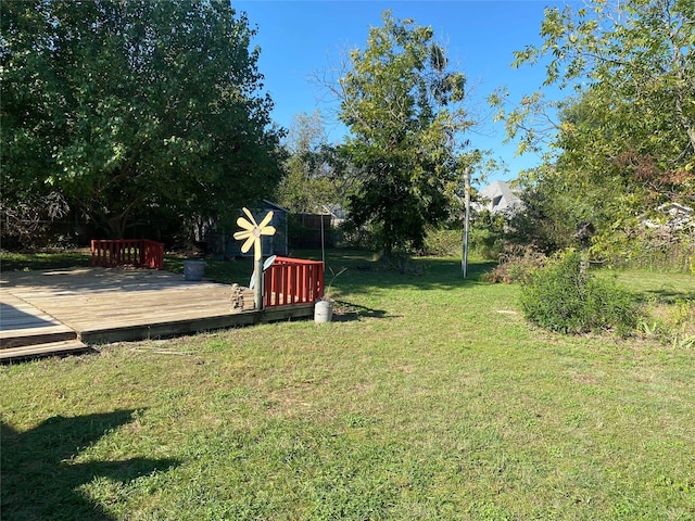 view of yard with a deck