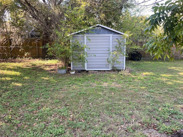 view of outdoor structure featuring a yard