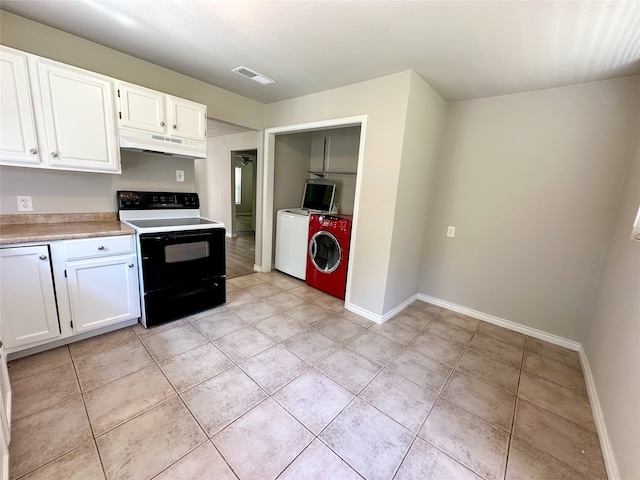 kitchen featuring white cabinetry, light tile patterned flooring, and white electric stove