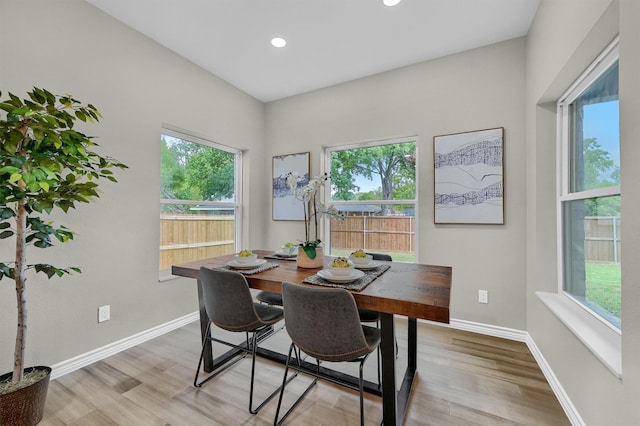 dining space featuring light hardwood / wood-style floors