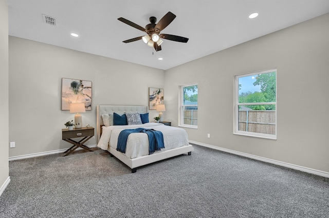 carpeted bedroom with ceiling fan