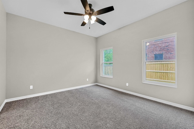 carpeted empty room with ceiling fan