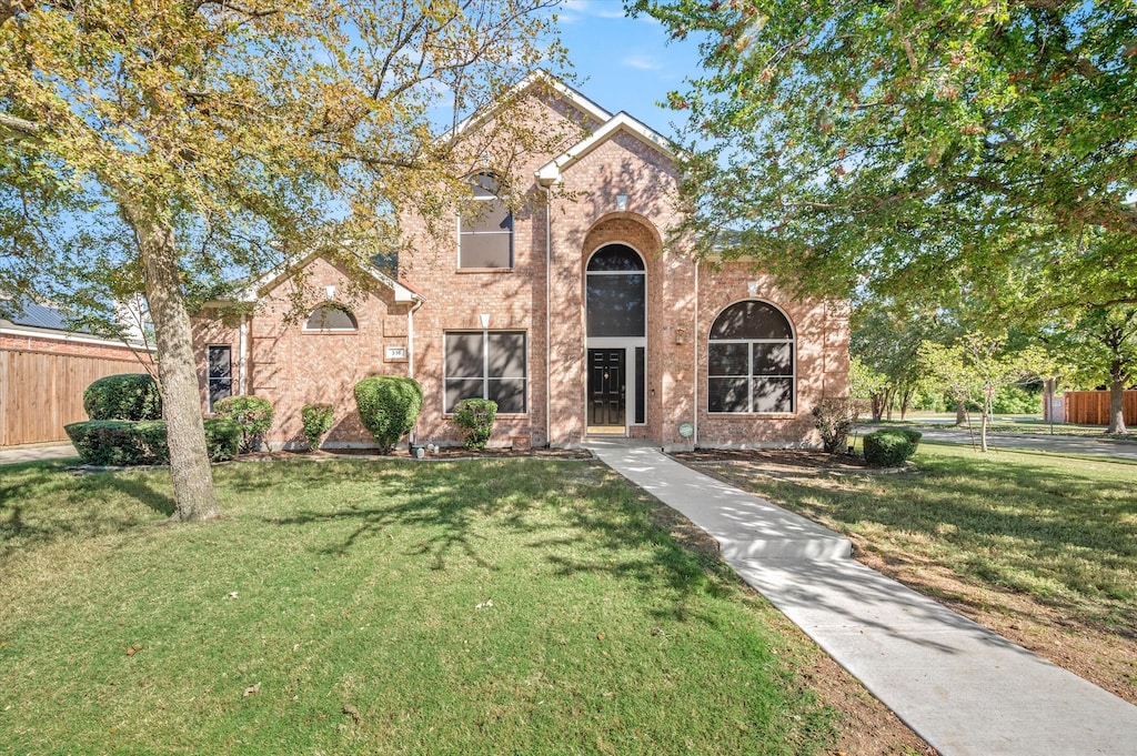 view of front of home with a front lawn