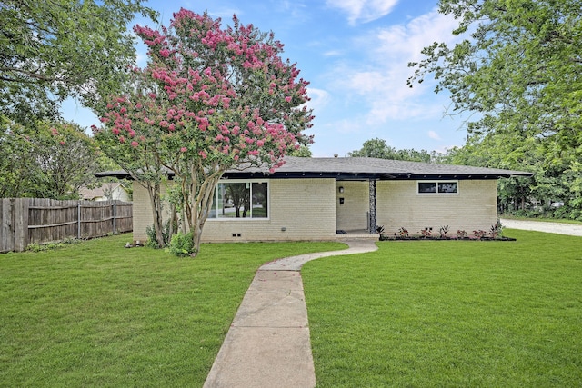 view of front of property with a front lawn