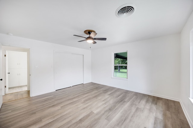 interior space featuring light hardwood / wood-style floors and ceiling fan