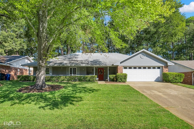 single story home with a porch, a garage, and a front lawn