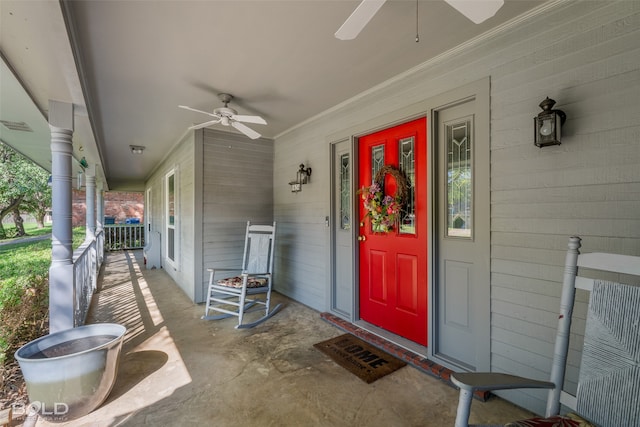 property entrance featuring ceiling fan and covered porch