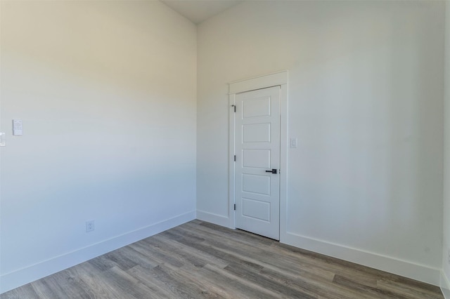 spare room with light wood-type flooring