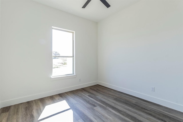 unfurnished room with ceiling fan, wood-type flooring, and a wealth of natural light