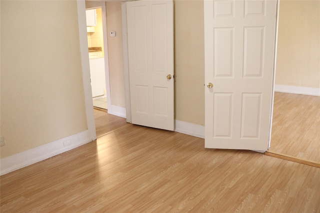 unfurnished bedroom featuring light hardwood / wood-style flooring