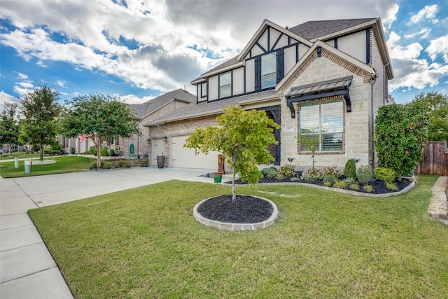 view of front facade featuring a garage and a front yard