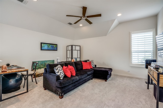 living room with light carpet, lofted ceiling, and ceiling fan