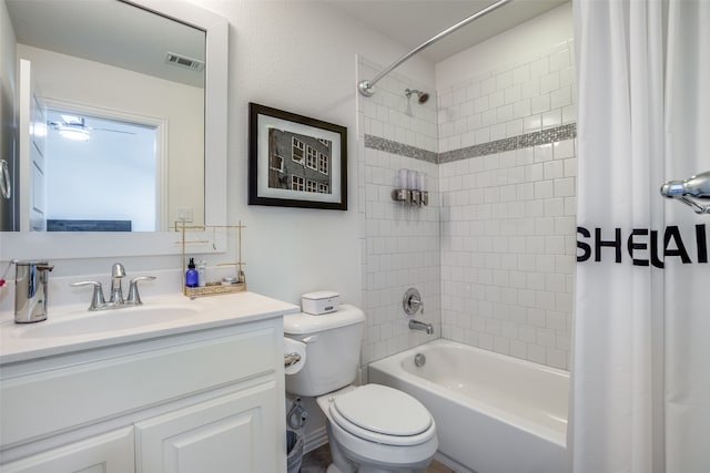 full bathroom with shower / bathtub combination with curtain, toilet, and vanity