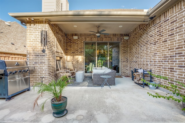 view of patio / terrace with grilling area and ceiling fan