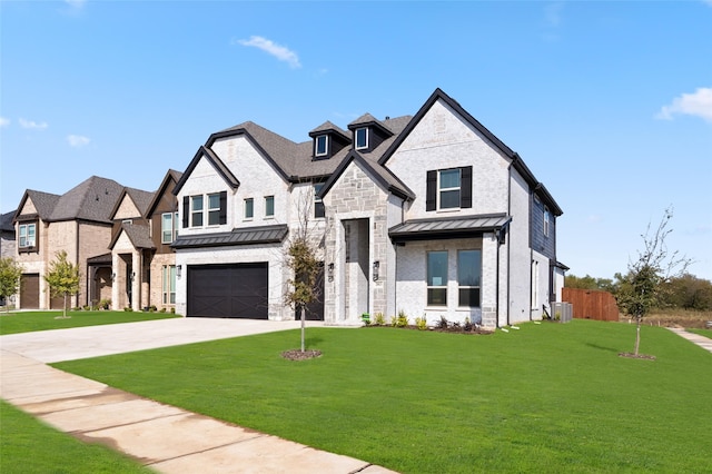 view of front facade featuring a garage and a front yard