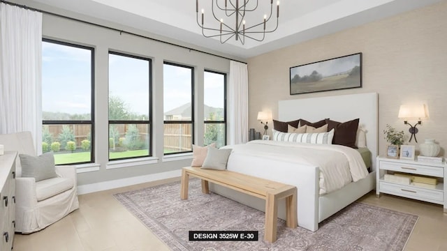 bedroom with a chandelier and hardwood / wood-style flooring