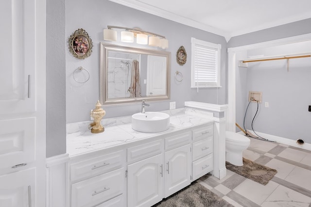 bathroom featuring ornamental molding, vanity, a shower, and toilet