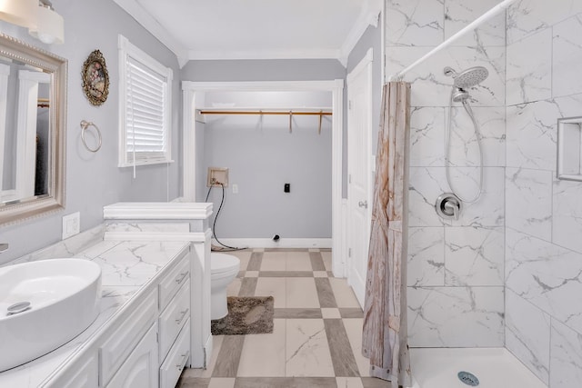 bathroom featuring crown molding, toilet, vanity, and a shower with shower curtain