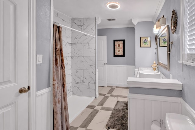 bathroom featuring crown molding, vanity, toilet, and a shower with curtain