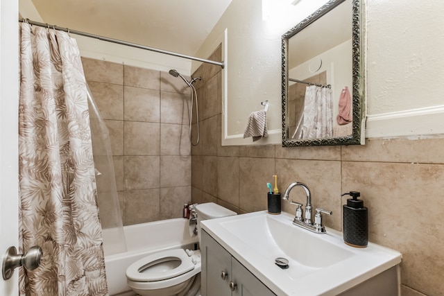 full bathroom featuring vanity, tasteful backsplash, shower / tub combo, tile walls, and toilet