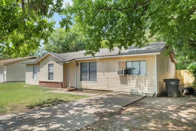 view of front of house featuring a front yard and a patio area