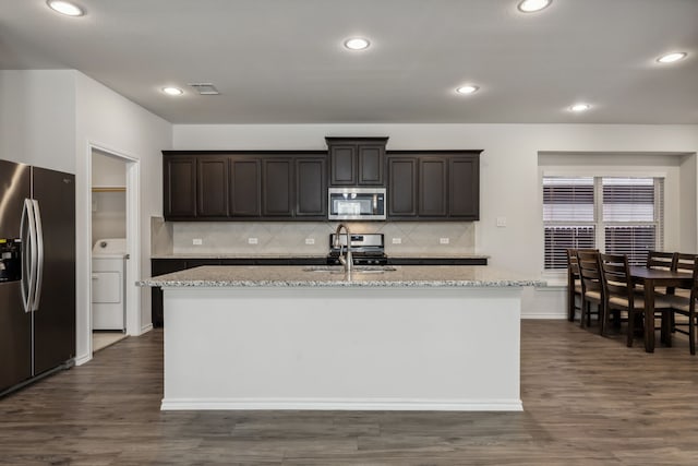 living room featuring ceiling fan and dark hardwood / wood-style flooring