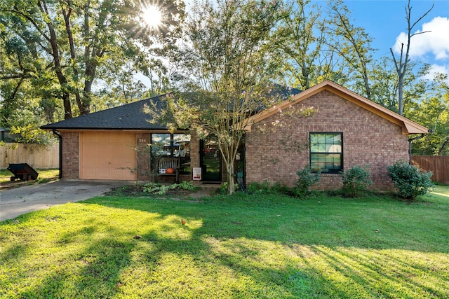 ranch-style house with a front yard and a garage