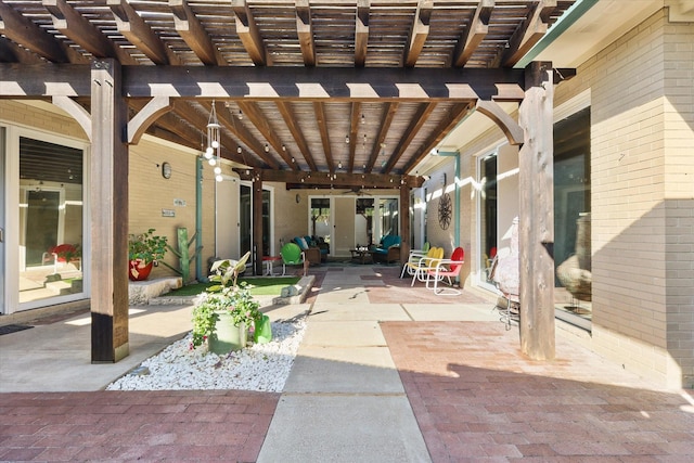 view of patio / terrace with a pergola and ceiling fan