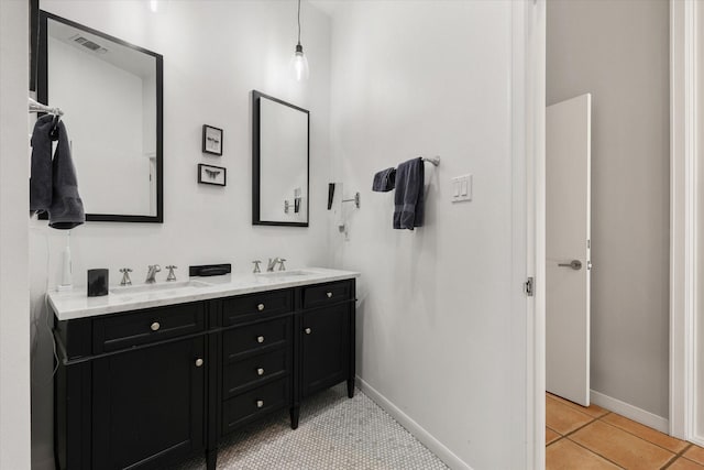 bathroom featuring tile patterned floors and vanity