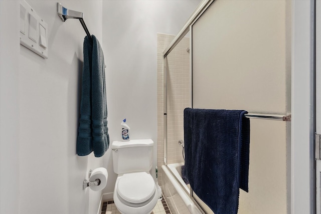 bathroom featuring tile patterned floors and toilet