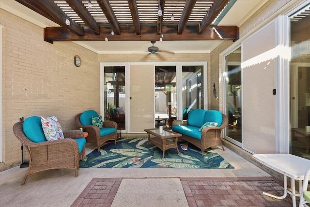 view of patio with an outdoor living space, ceiling fan, and a pergola