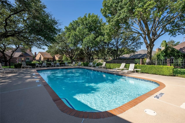 view of swimming pool featuring a patio area