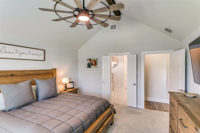 bedroom with light carpet, ceiling fan, and high vaulted ceiling