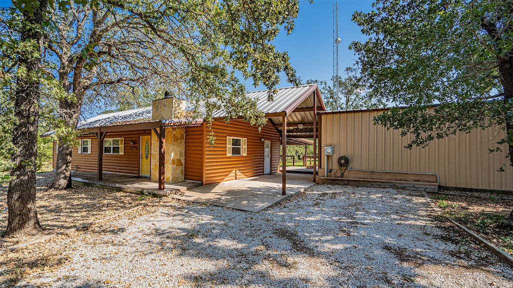 rear view of property with a patio area